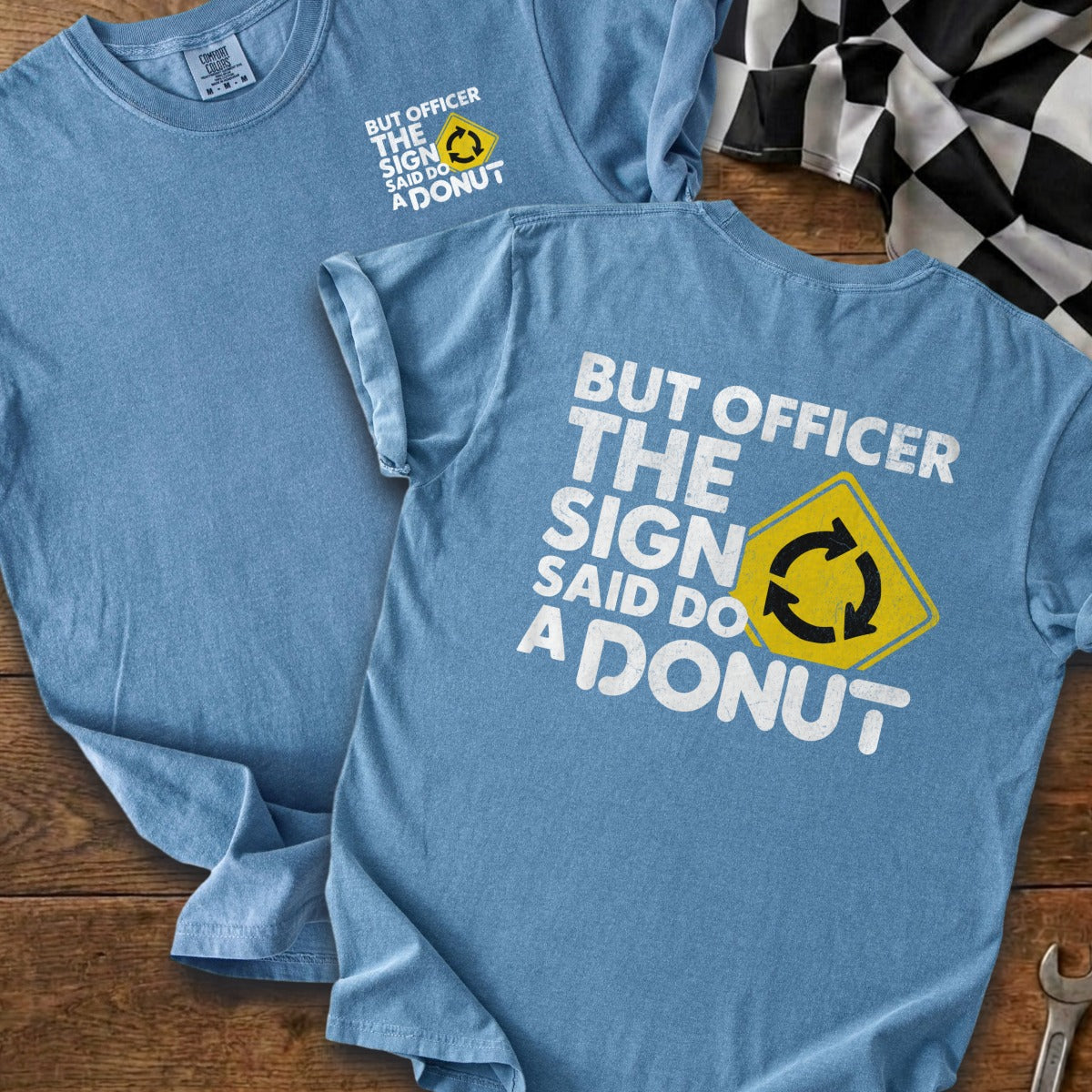 Blue t-shirt with "But Officer The Sign Said Do A Donut" text and graphic.