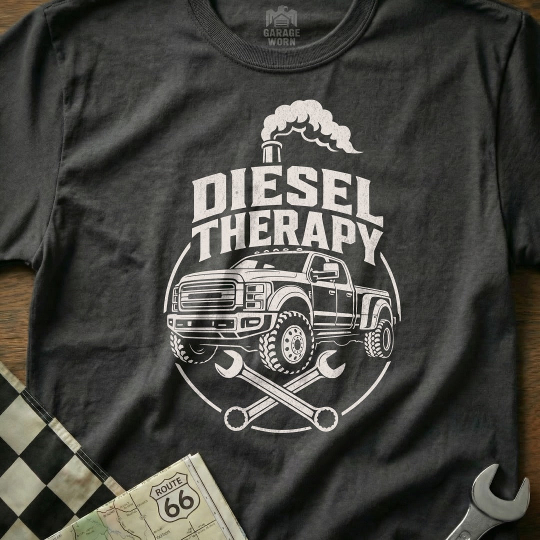 Diesel Therapy graphic on a dark gray t-shirt with a pickup truck and wrenches.