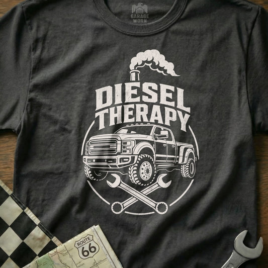 Diesel Therapy graphic on a dark gray t-shirt with a pickup truck and wrenches.