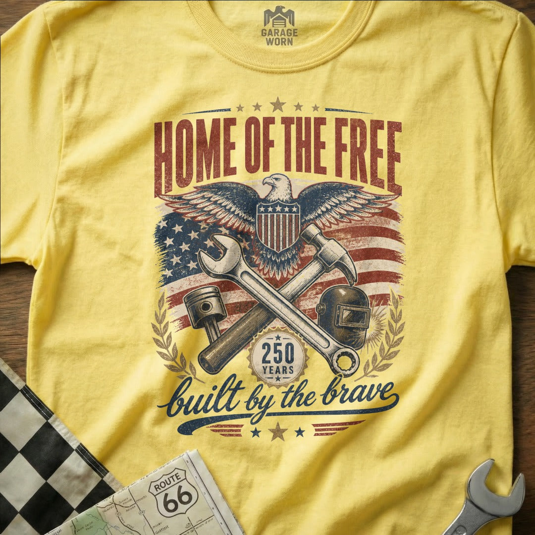 Yellow t-shirt with "Home of the Free Built by the Brave" graphic.