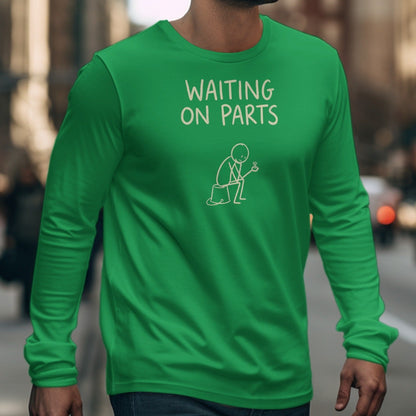 Green long sleeve shirt with "WAITING ON PARTS" and stick figure holding a bolt.