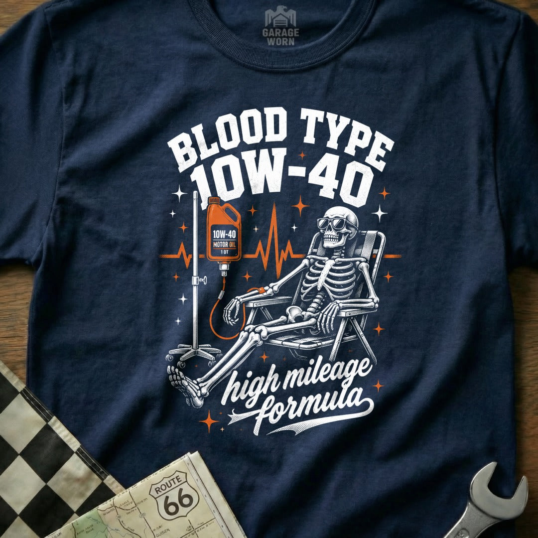 Skeleton receiving IV drip of 10W-40 motor oil with text "Blood Type 10W-40".