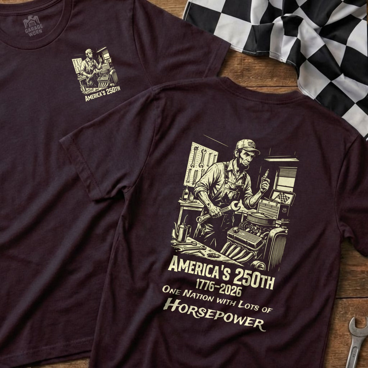 T-shirt with vintage mechanic graphic and "America's 250th" text.