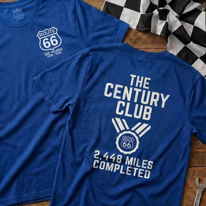Blue t-shirts with Route 66 designs, one showing "100 Years" and the other "The Century Club."