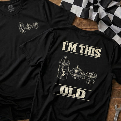 Black t-shirt with "I'm This Old" text and vintage ignition coil illustration.