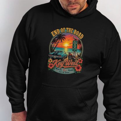 Key West graphic with car, motorcycle, sunset, palm trees, and text "End of the Road".