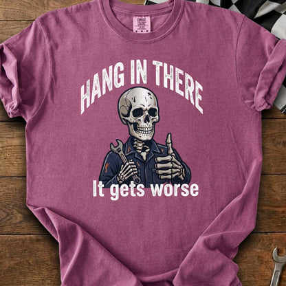 Skeleton mechanic with wrench and thumbs-up: "Hang in there. It gets worse."