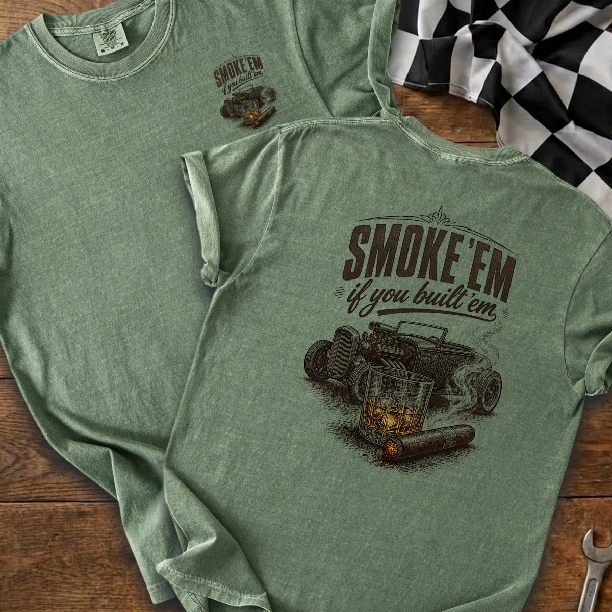 Green t-shirt with "SMOKE'EM if you built 'em" text, hot rod, whiskey and cigar graphic.