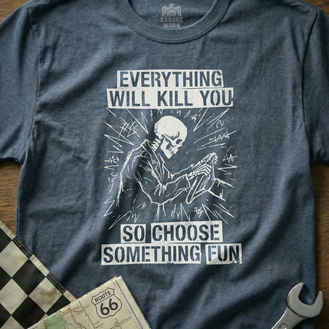 Graphic t-shirt with skeleton driving and text "Everything will kill you so choose something fun."