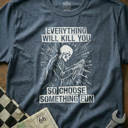 Graphic t-shirt with skeleton driving and text "Everything will kill you so choose something fun."