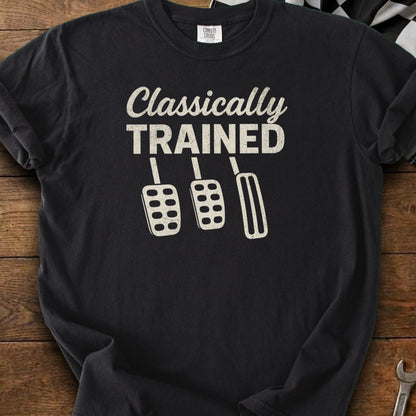 Black t-shirt with "Classically TRAINED" and three manual transmission pedals.