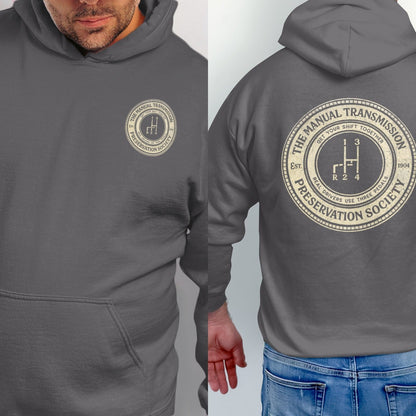 Dark grey hoodie with a circular graphic on the back featuring a gear shift.