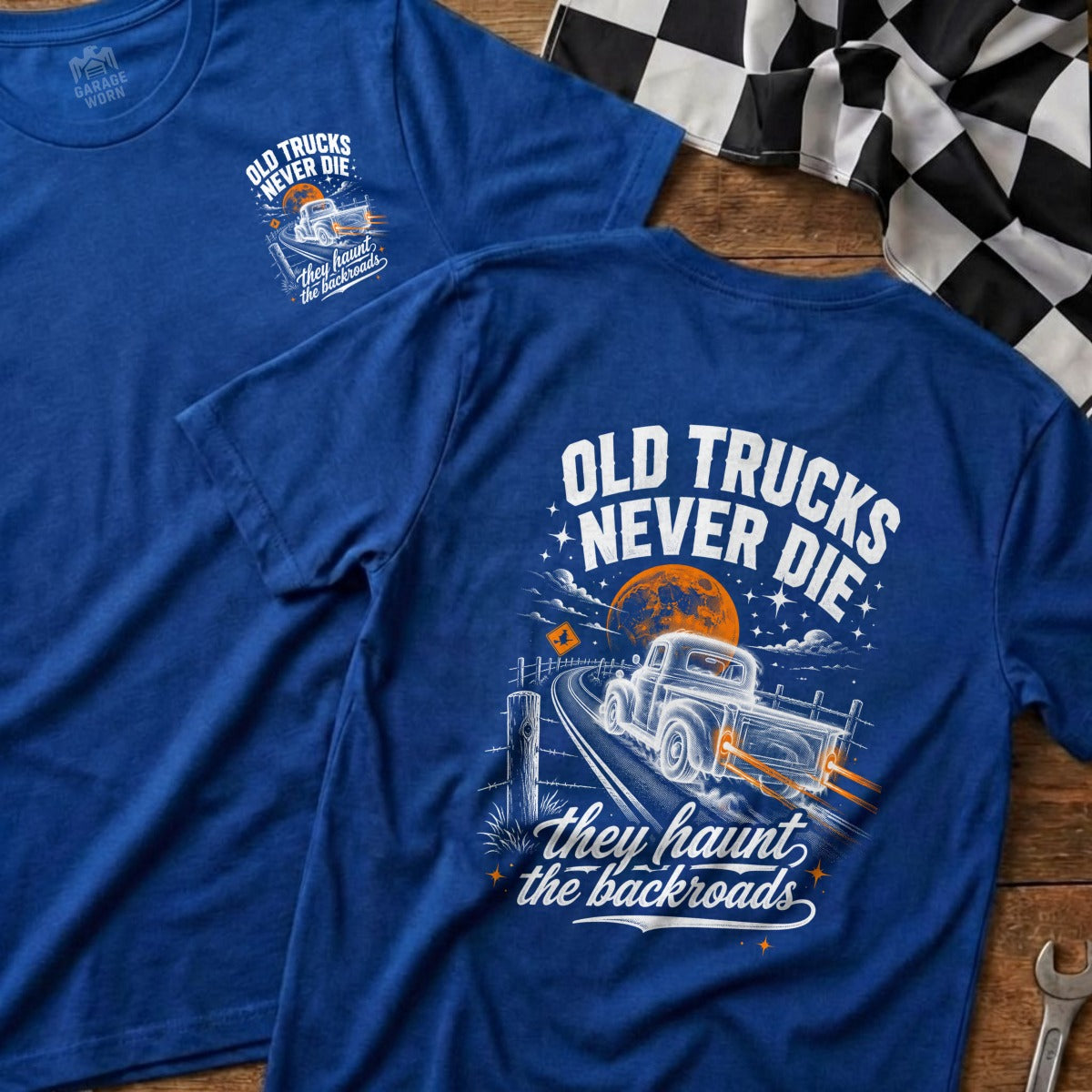 Blue t-shirt with graphic: old trucks never die they haunt the backroads.