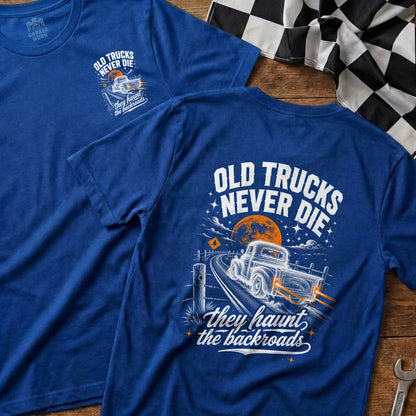 Blue t-shirt with graphic: old trucks never die they haunt the backroads.