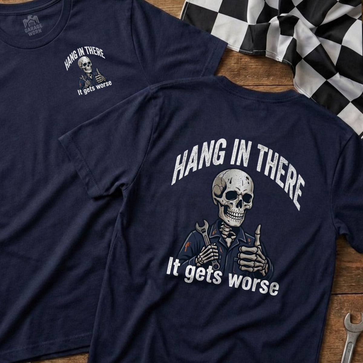 Navy t-shirt with skeleton giving thumbs up and "Hang In There, It gets worse" text.