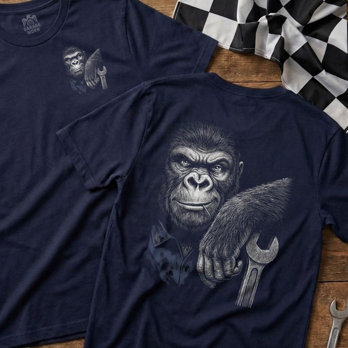 Navy t-shirt with a detailed sketch of a gorilla holding a wrench.