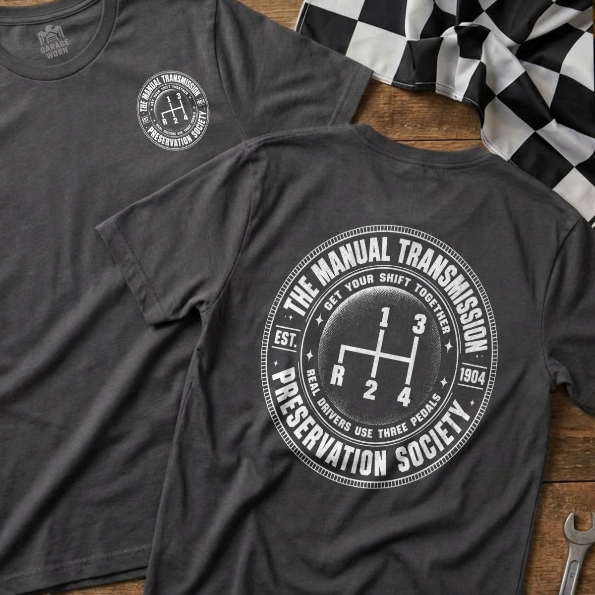 Gray t-shirt with "The Manual Transmission Preservation Society" logo and gear shift design.
