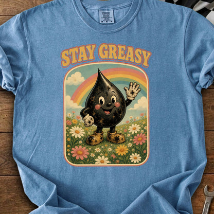Blue t-shirt with cartoon oil drop character and "STAY GREASY" text.