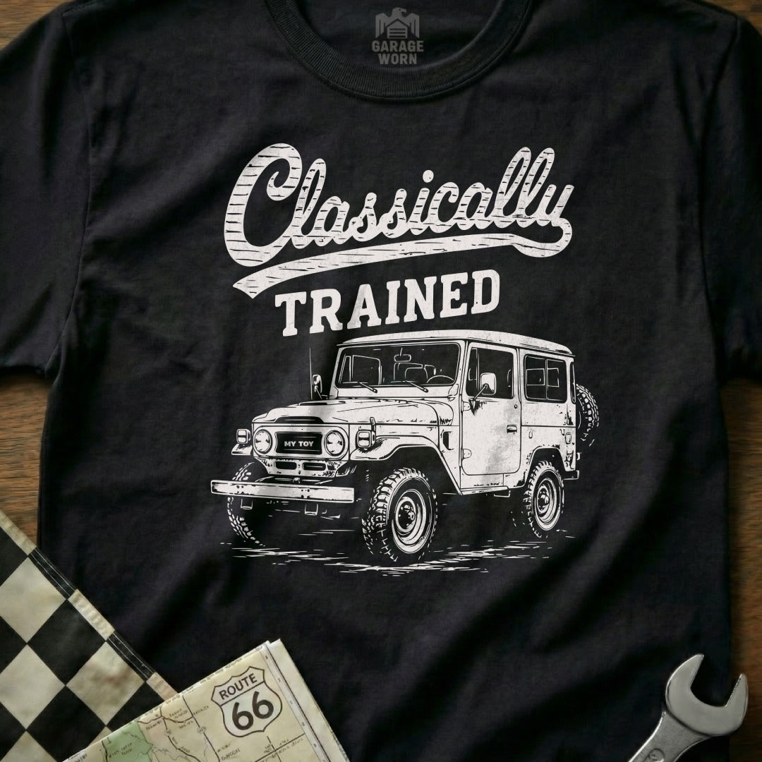 Black t-shirt with white graphic of classic SUV and text "Classically TRAINED".