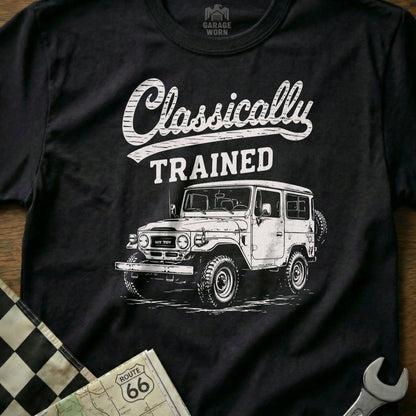 Black t-shirt with white graphic of classic SUV and text "Classically TRAINED".