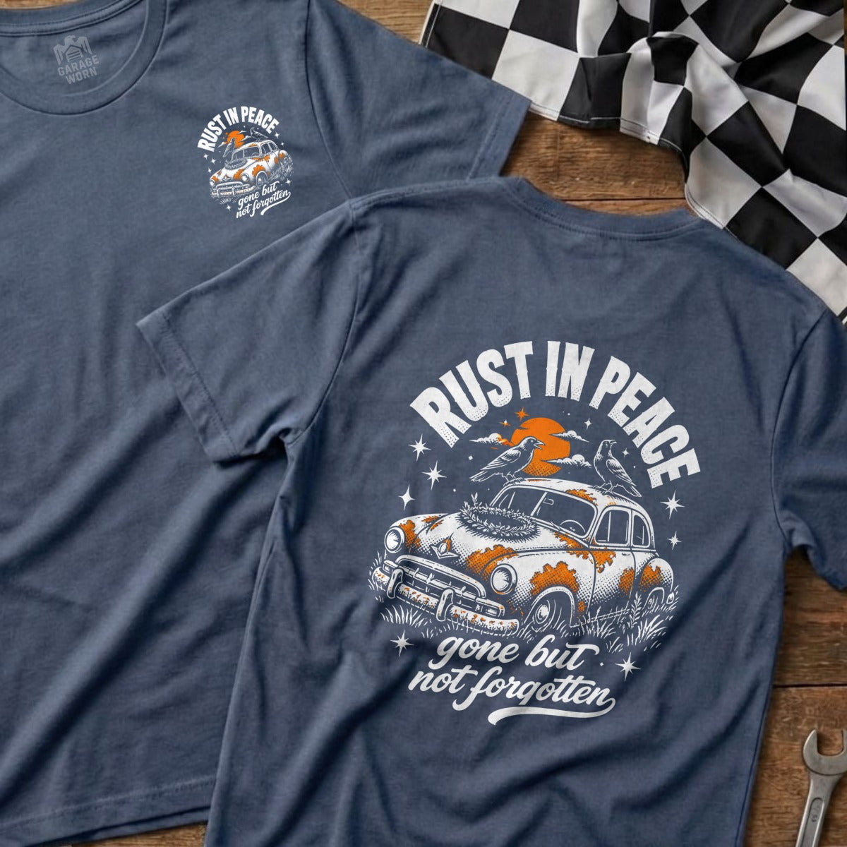 Blue t-shirt with "Rust in Peace" and a vintage car graphic.
