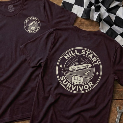 Maroon t-shirt with "Hill Start Survivor" text and vintage car graphic.