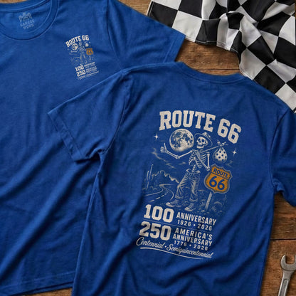 Two blue t-shirts display Route 66 anniversary graphics with a skeleton hitchhiker.