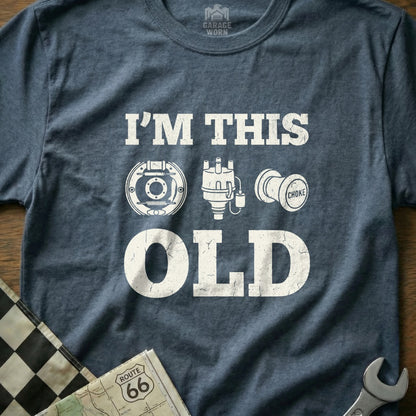T-shirt with "I'M THIS OLD" text and car part icons.
