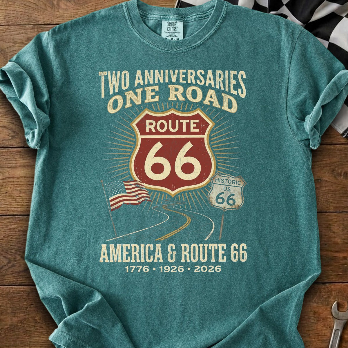 Teal t-shirt with Route 66 graphic, American flag, and text "America & Route 66".