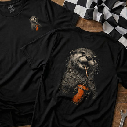 Black t-shirt with a detailed illustration of an otter drinking from an oil can.