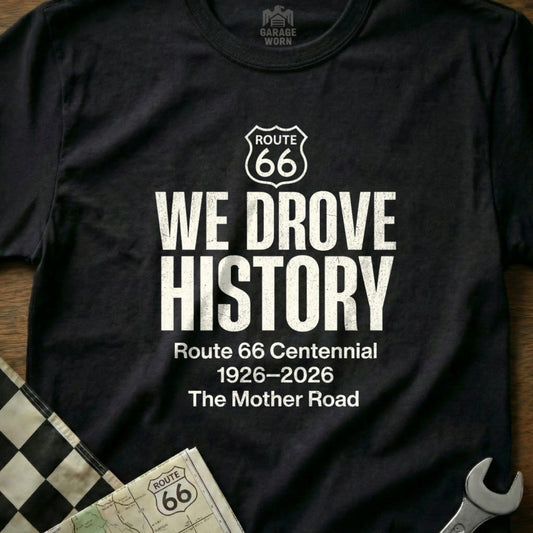 Black t-shirt with "WE DROVE HISTORY Route 66 Centennial 1926-2026 The Mother Road".