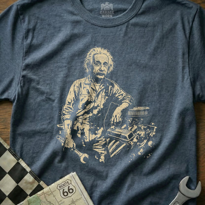Albert Einstein leaning on an engine, holding tools, with Route 66 map.