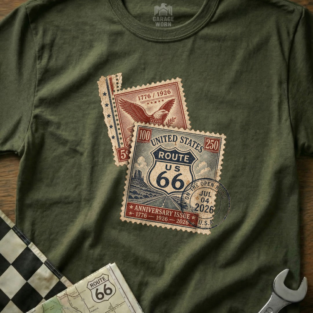 Olive green t-shirt featuring vintage postage stamps for Route 66 anniversary.
