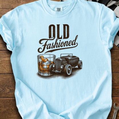 Light blue t-shirt with "OLD Fashioned" text, a whiskey glass, and a hot rod car.