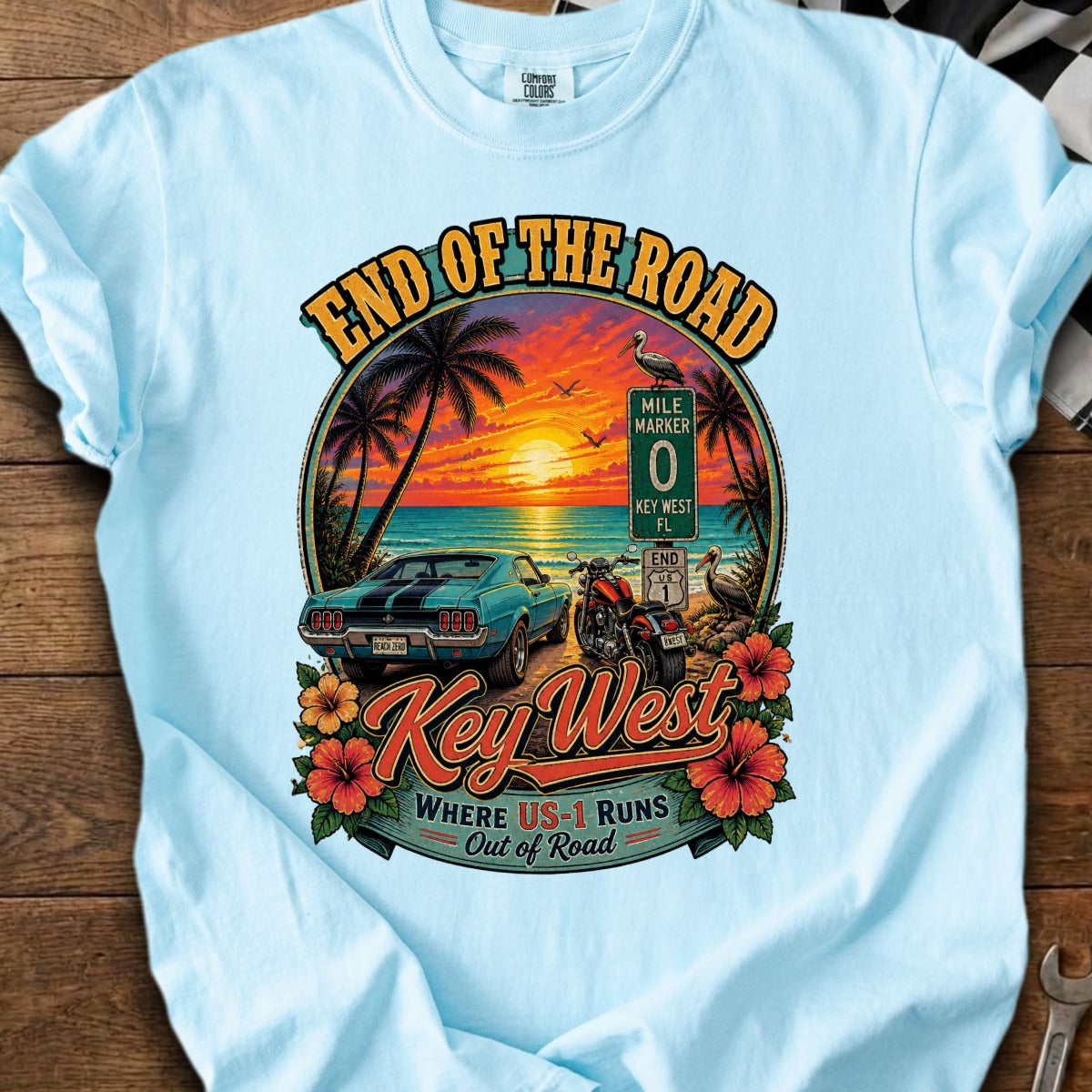 Key West graphic t-shirt with a vintage car, motorcycle, and sunset.