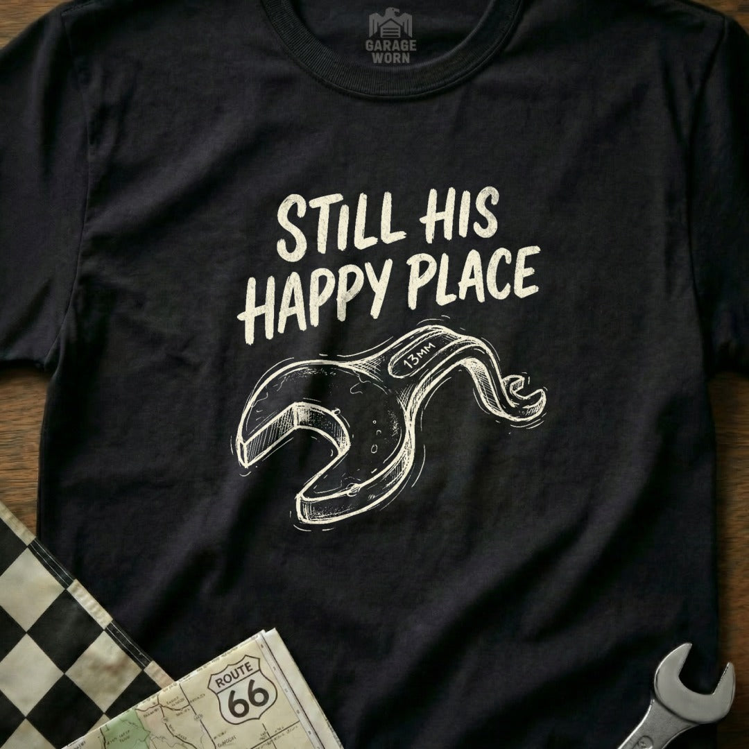 Black t-shirt with "STILL HIS HAPPY PLACE" and a wrench graphic.