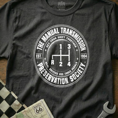 T-shirt with "The Manual Transmission Preservation Society" and gear shift diagram.