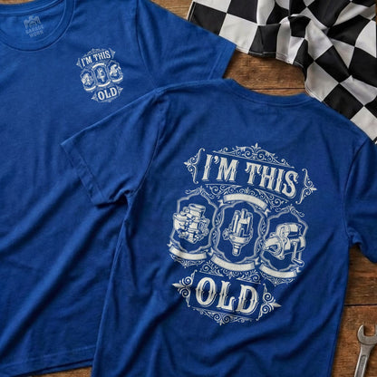 Blue t-shirt with "I'm This Old" and vintage engine parts graphic.