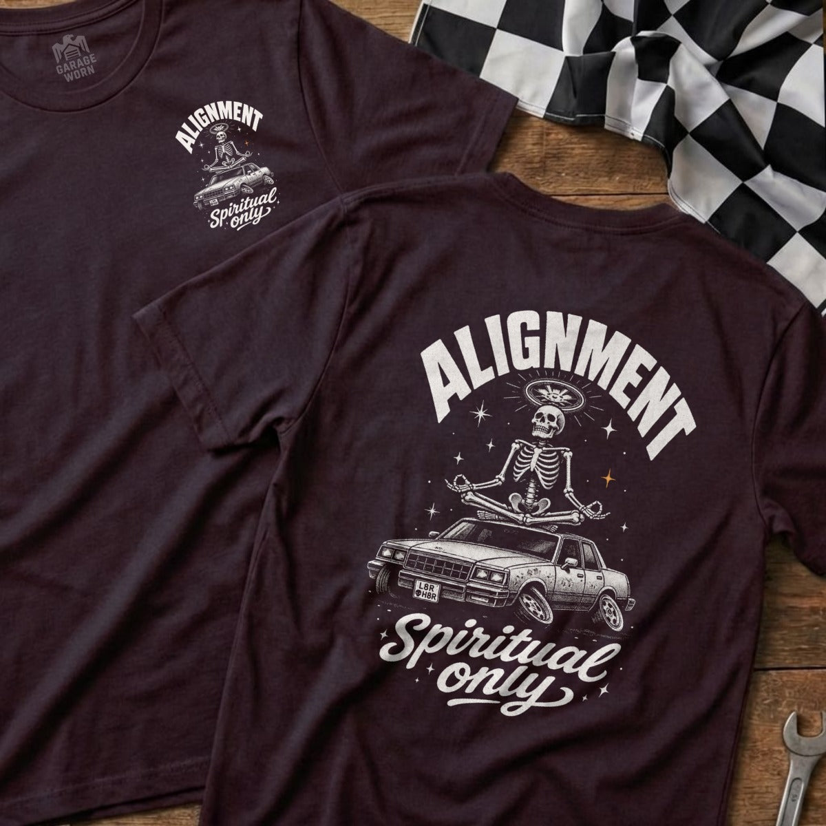 T-shirt graphic: skeleton meditating on car, text "Alignment Spiritual only"