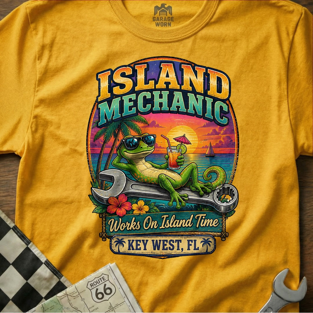 Island Mechanic gecko with drink rests on wrench, Key West, FL.