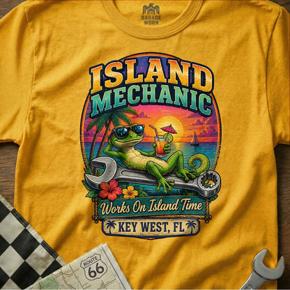 Island Mechanic gecko with drink rests on wrench, Key West, FL.