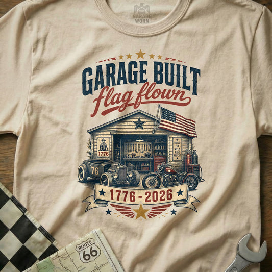 Garage Built Flag Flown t-shirt with garage, hot rod, motorcycle, and American flag.