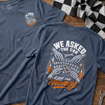 T-shirt with "We Asked the Car, It Just Said Money" Ouija board graphic.