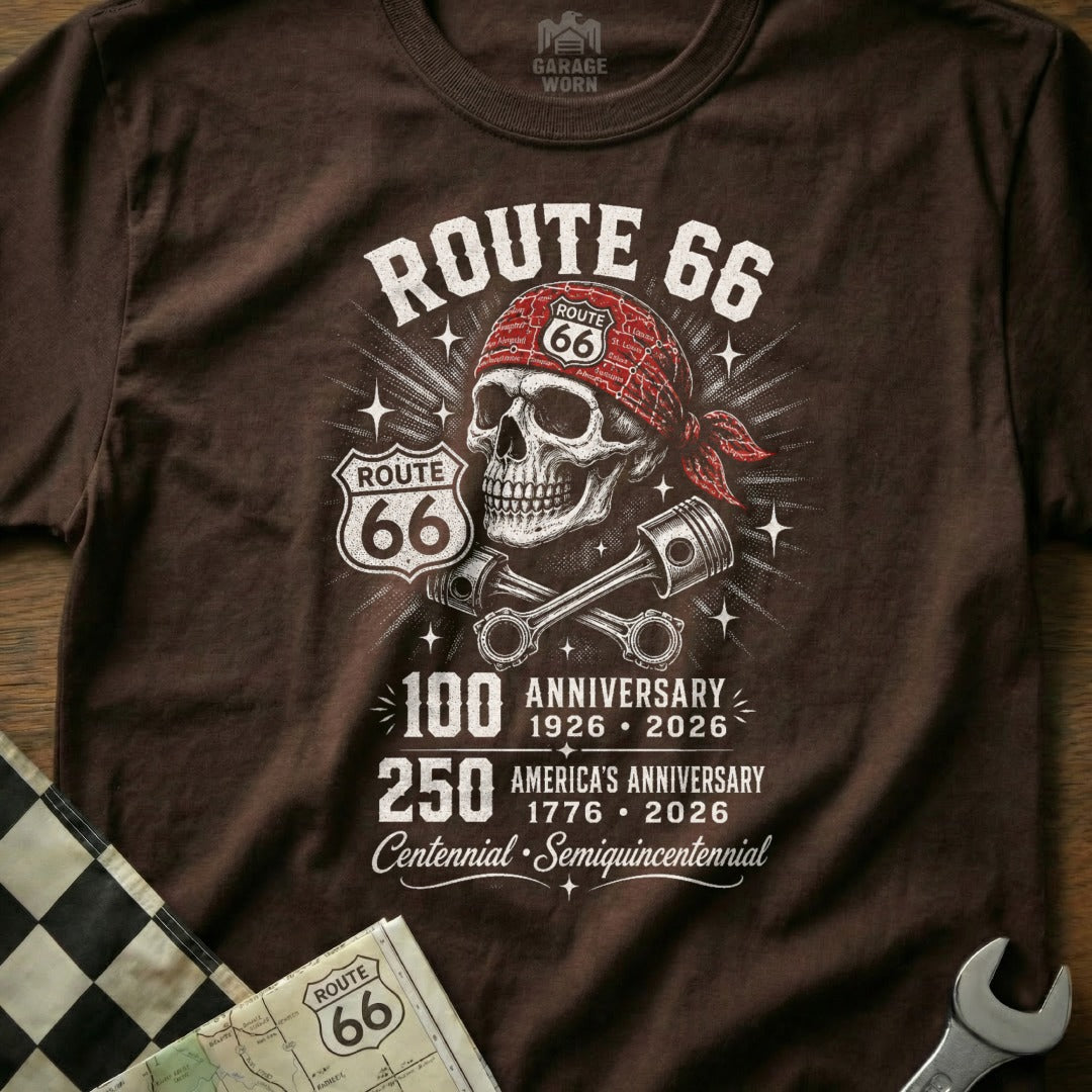 Brown t-shirt with Route 66 skull, pistons, and anniversary dates.