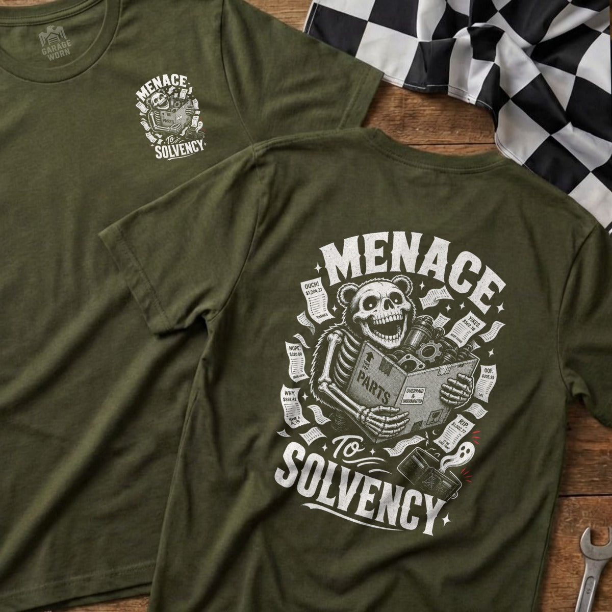 Olive green t-shirt with a skeleton bear holding a box of "PARTS" and receipts.
