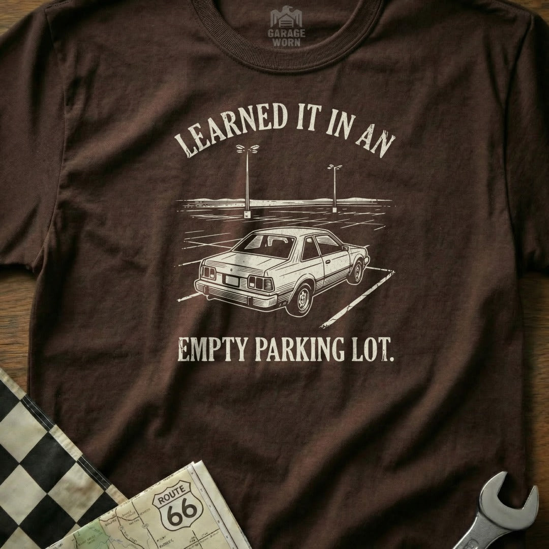 Brown t-shirt with "Learned it in an empty parking lot" and a car graphic.