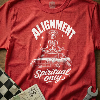 Red t-shirt with a skeleton meditating on a car, reading "Alignment Spiritual only".