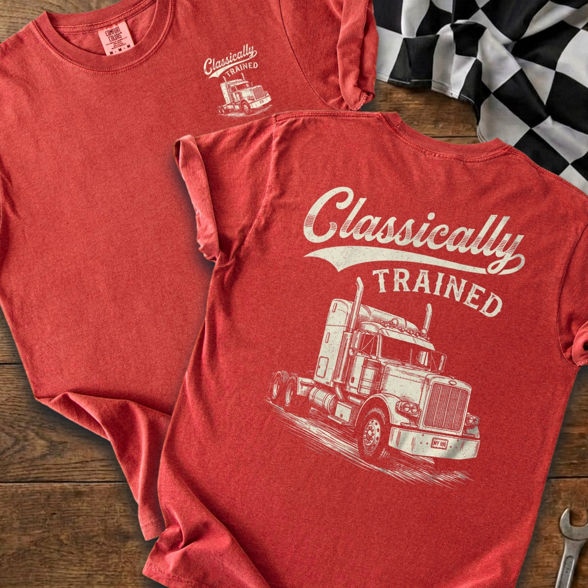 Red t-shirt with a white graphic of a semi-truck and text "Classically TRAINED".