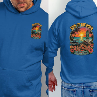 Key West "End of the Road" graphic with classic car, motorcycle, and sunset.
