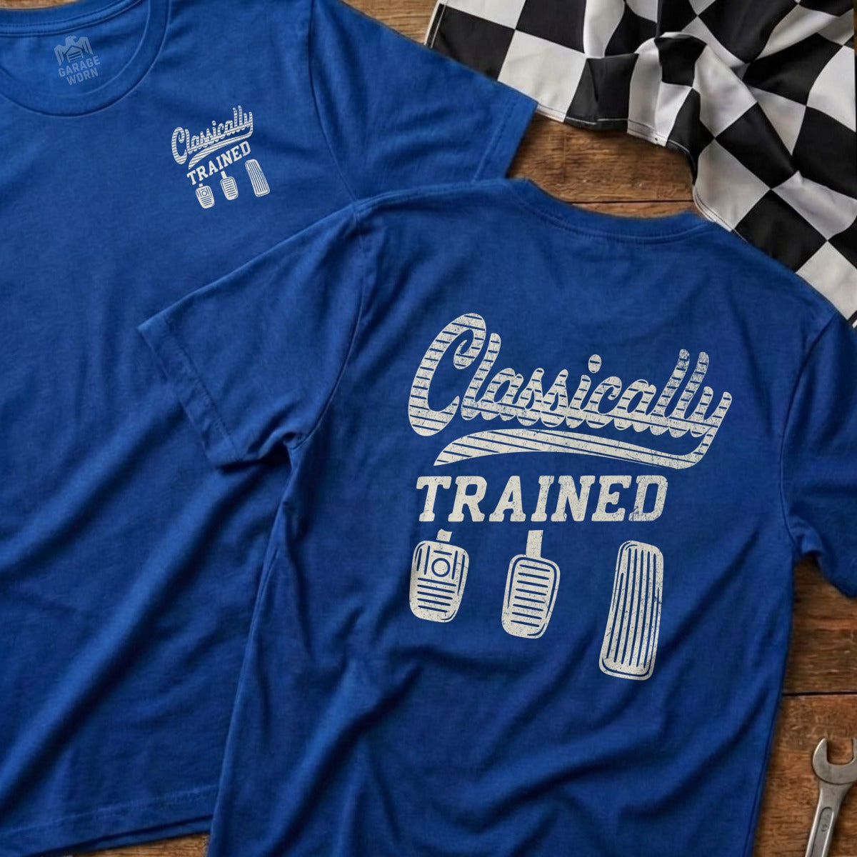 Blue t-shirt with "Classically Trained" and clutch, brake, gas pedals graphic.